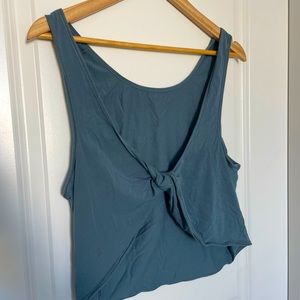 Twist back crop tank. Loose fitting. Color is a bluish gray